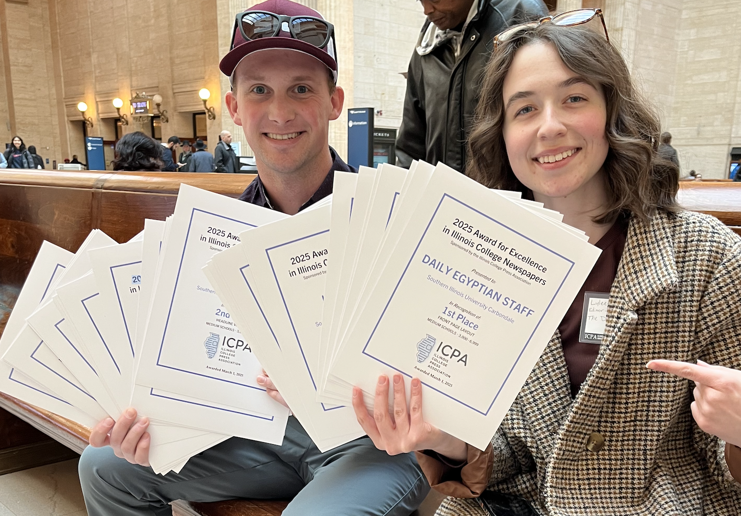 Students holding awards