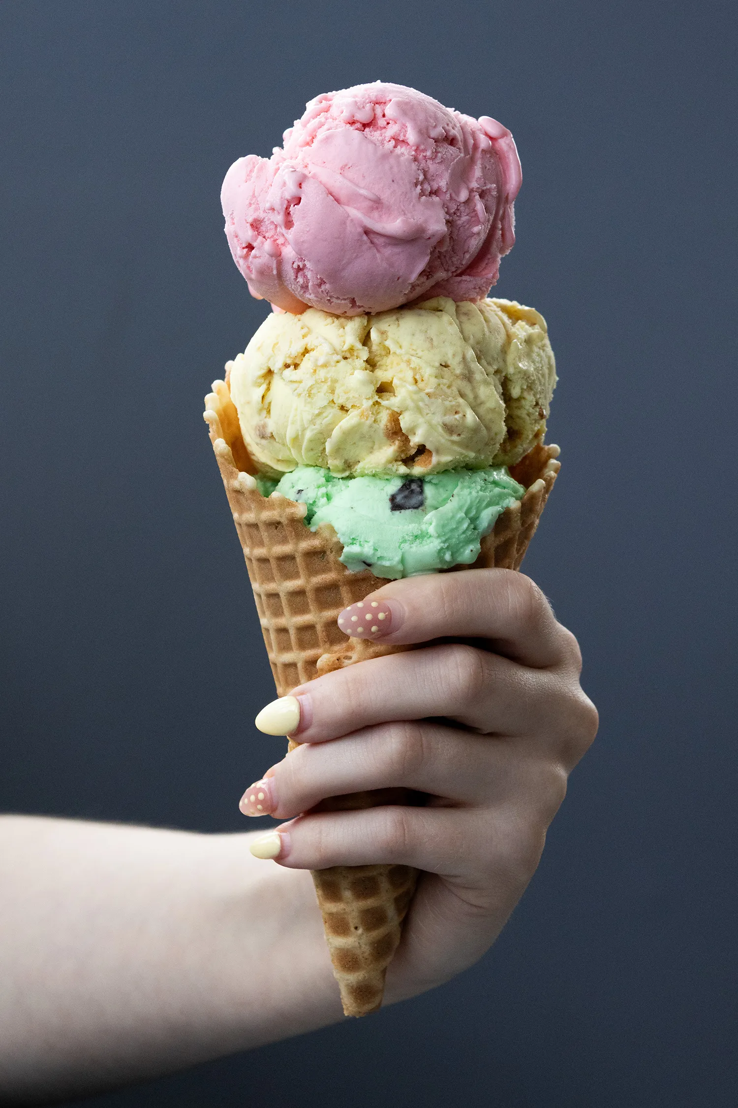 Hand holding an Ice Cream Cone